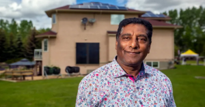 Kae Shummoogum showed off his wind and solar powered home near Calgary with 17 solar panels on the roof and thermal solar panel on the side.