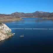 The San Vicente reservoir in San Diego County stores water from as far away as the Colorado River. Pumping water into a smaller reservoir in the surrounding mountains could store excess solar power until it's needed, when the sun sets.