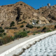 Proposal to place solar panels over the 370-mile Los Angeles Aqueduct to reduce evaporation and add capacity for renewable energy was approved
