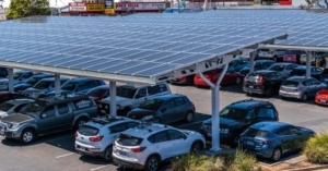 Solar panels placed over parking spaces are among the many options that can help companies get closer to their sustainability goals.