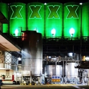 Iconic Australian beer brand XXXX will be brewed using 100% clean energy from Lightsource bp’s 176 MW Woolooga solar farm.