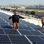 Former Gov. Arnold Schwarzenegger and a crowd of more than 100 people celebrated a completed solar rooftop project at AltaSea.