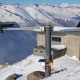 A Swiss startup is using reclaimed wind turbine blades instead of metal beams as horizontal supports for solar panels.