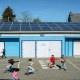 Charitable foundations are using a variety of strategies to get solar panels for health centers, schools and other community buildings.